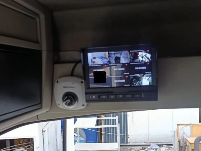 Dome camera and split-screen monitor inside a truck cab